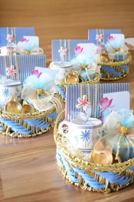 Several Blue Lotus Baskets arranged together with matching blue and gold finishes