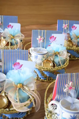 Coordinated Diwali baskets showing the repeated blue fabric and greeting details