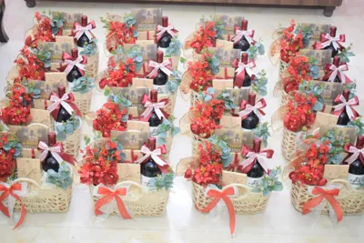 A batch of celebration baskets with matching red and white bows