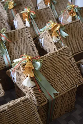 Wider view of the coordinated woven baskets with greeting tags